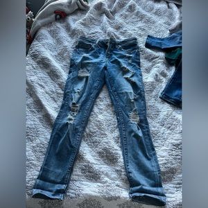 Buckle Black skinny jeans